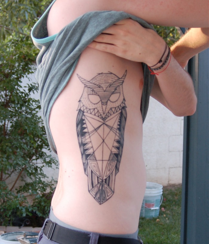 Cool Geometric Owl Tattoo On Man Right Side Rib