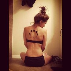 Cool Phases Of The Moon Tattoo On Girl Upper Back