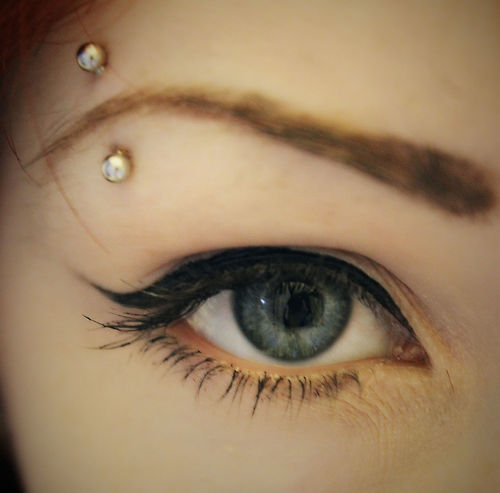 Curved Barbell Eyebrow Piercing