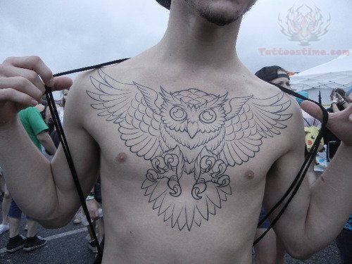 Cute Black Outline Flying Owl Tattoo On Man Chest