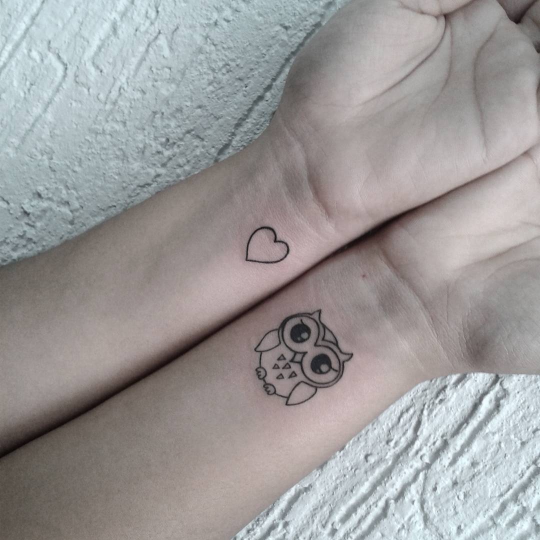 Cute Black Outline Heart And Baby Owl Tattoo On Both Wrist