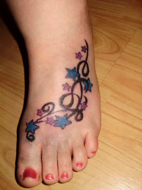 Cute Colored Stars Tattoos On Left Foot