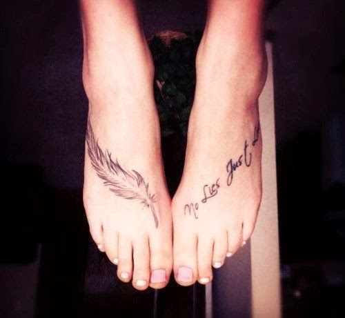 Cute Grey Ink Feather Tattoo On Foot
