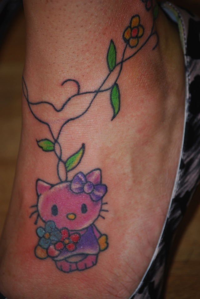 Cute Hello Kitty Tattoo On Left Foot