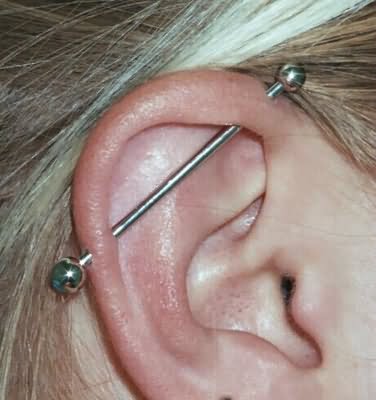 Cute Industrial Piercing With Silver Barbell