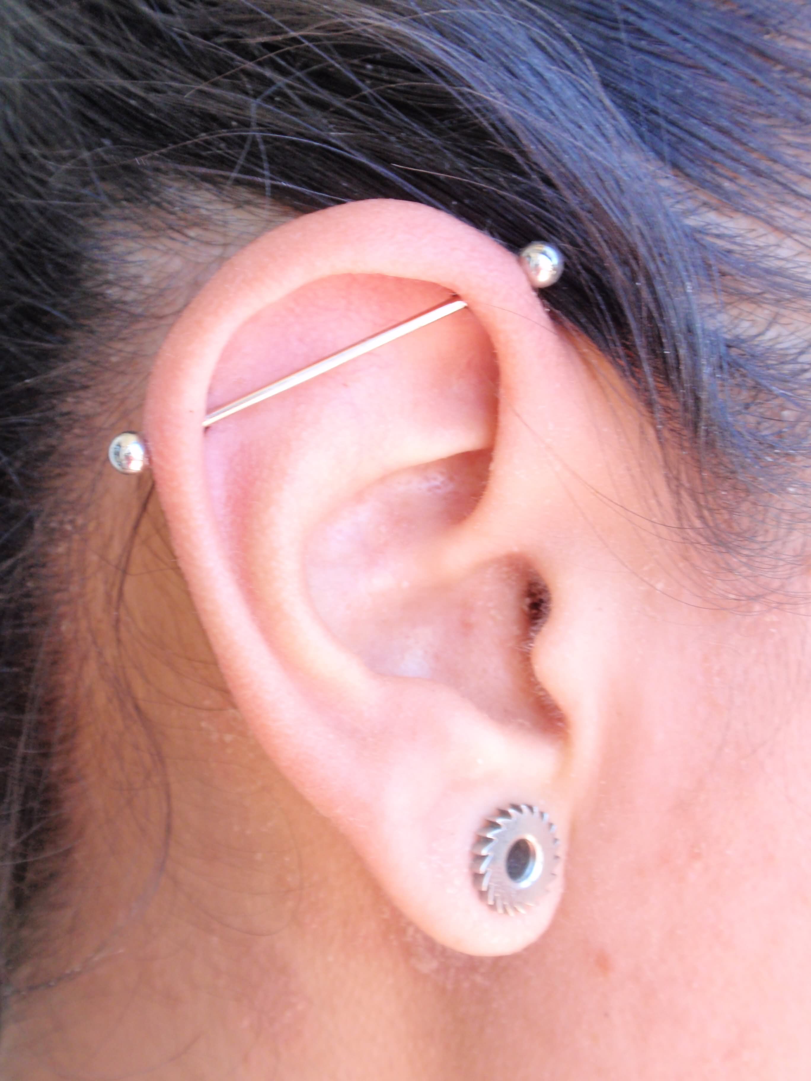 Cute Lobe And Industrial Piercing For Young Girls