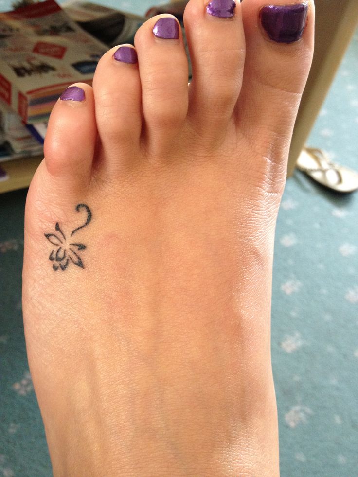 Cute Tiny Flower Tattoo On Left Foot