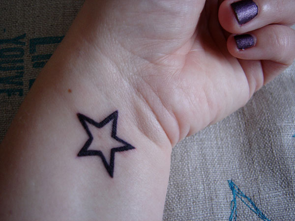 Cute Wrist Star Tattoo