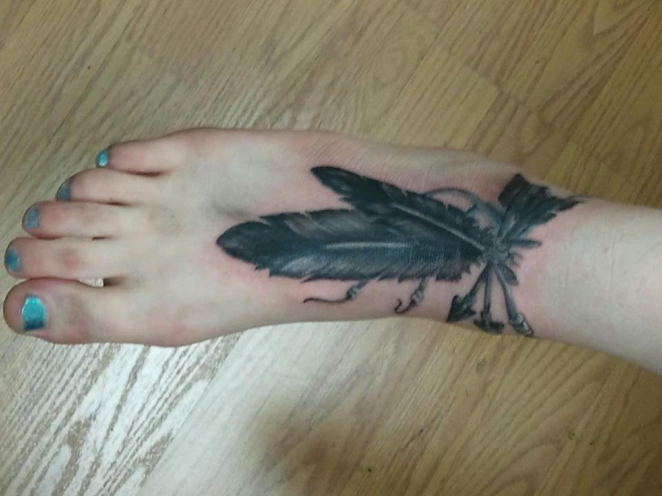 Dark Ink Indian Feather Ankle Tattoo