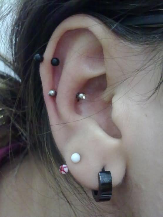 Double Lobe And Silver Barbell Snug Piercing
