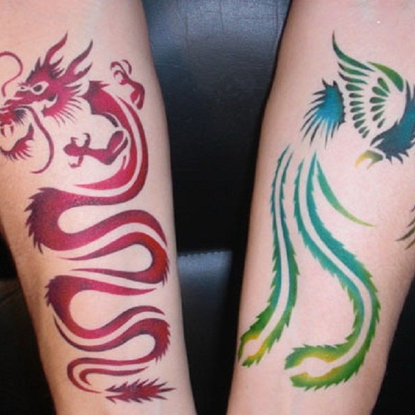 Dragon And Phoenix Tattoo On Both Forearm