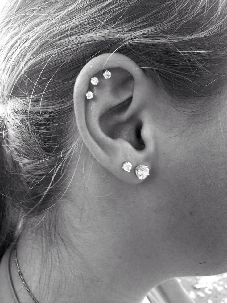 Dual Lobes And Triple Helix Piercing