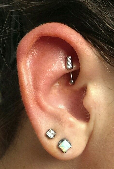 Dual Right Ear Lobe And Rook Piercing