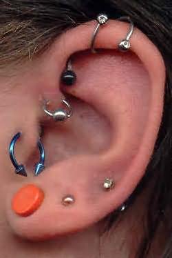 Ear Lobe And Helix Piercing