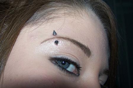 Eyebrow Piercing With Silver Spike Barbell For girls