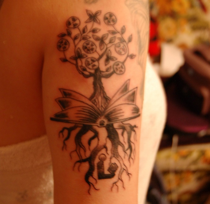Fantastic Black Ink Tree Of Life With Book Tattoo On Right Shoulder