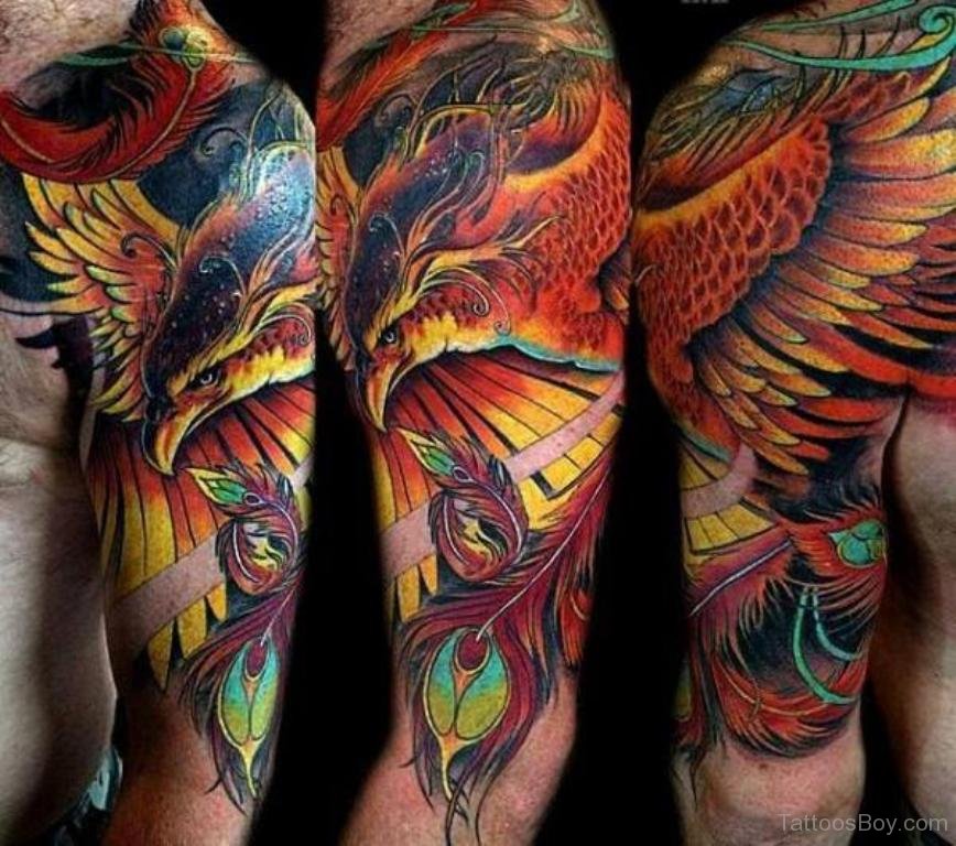 Fantastic Colorful Phoenix Tattoo On Man Left Half Sleeve