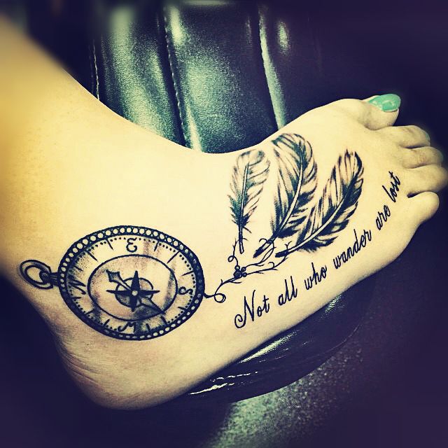 Feathers And Nautical Compass Tattoo On Right Foot