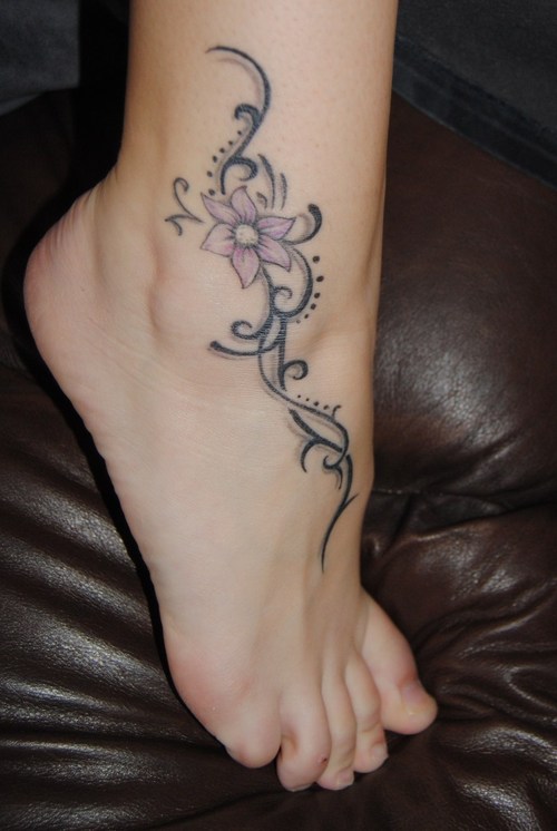 Flower And Tribal Ankle Band Tattoo