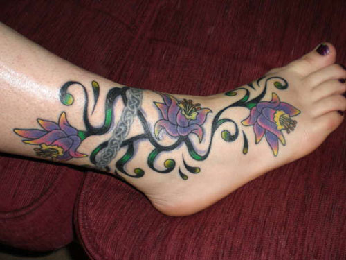 Flowers And Tribal Ankle Band Tattoo