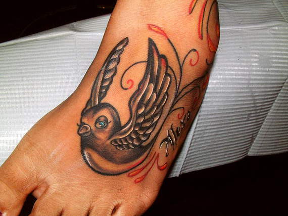 Flying Bird Tattoo On Left Foot