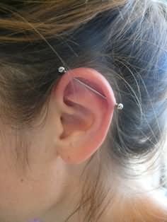 Girl Left Ear Industrial Piercing With Barbell