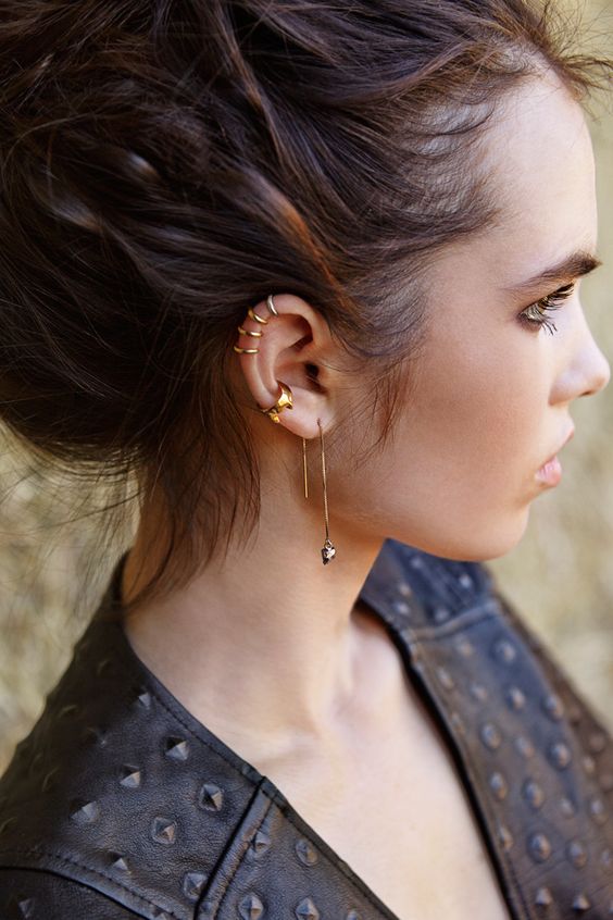 Girl With Ear Lobe And Helix Piercing