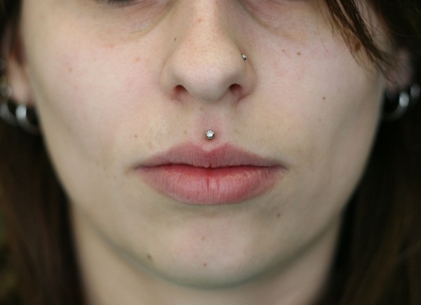 Girl With Left Nostril And Medusa Piercing