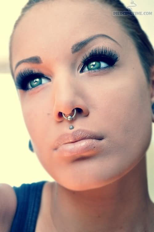 Girl With Medusa And Septum Piercing