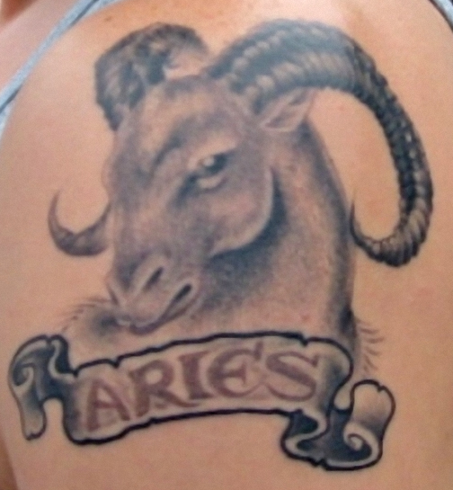 Grey Ink Aries Zodiac Sign With Banner Tattoo Design