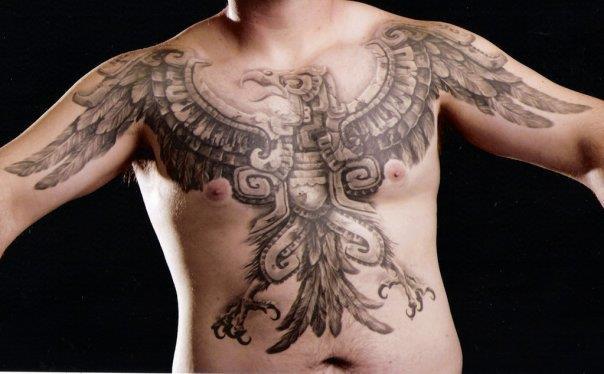 Grey Ink Aztec Phoenix Tattoo On Man Chest