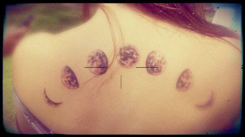Grey Ink Phases Of The Moon Tattoo On Girl Upper Back