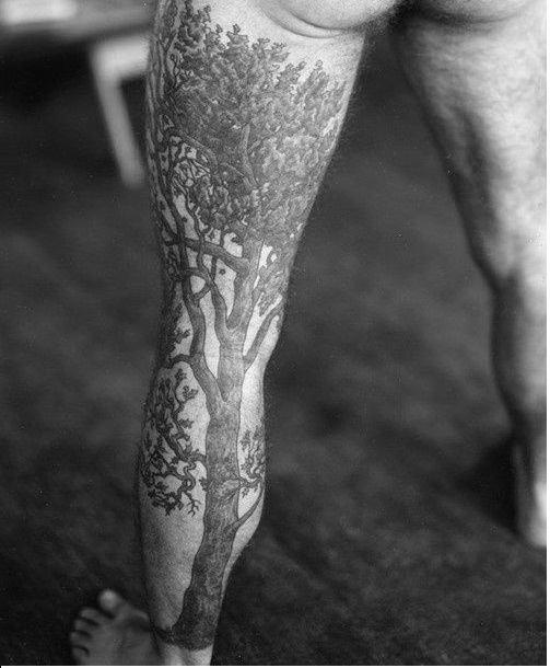 Grey Ink Tree Of Life Tattoo On Left Leg