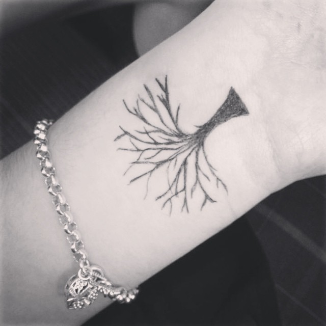 Grey Ink Tree Of Life Without Leaves Tattoo On Wrist