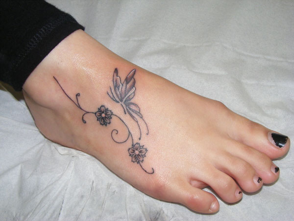 Grey Small Flowers And Butterfly Foot Tattoo