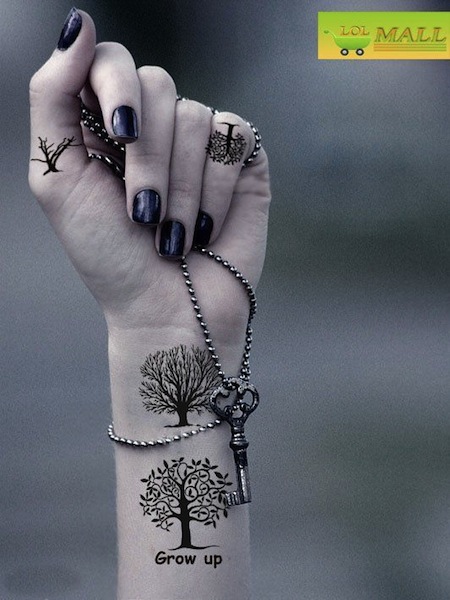 Grow Up - Black Ink Tree Of Life Tattoo On Girl Left Wrist