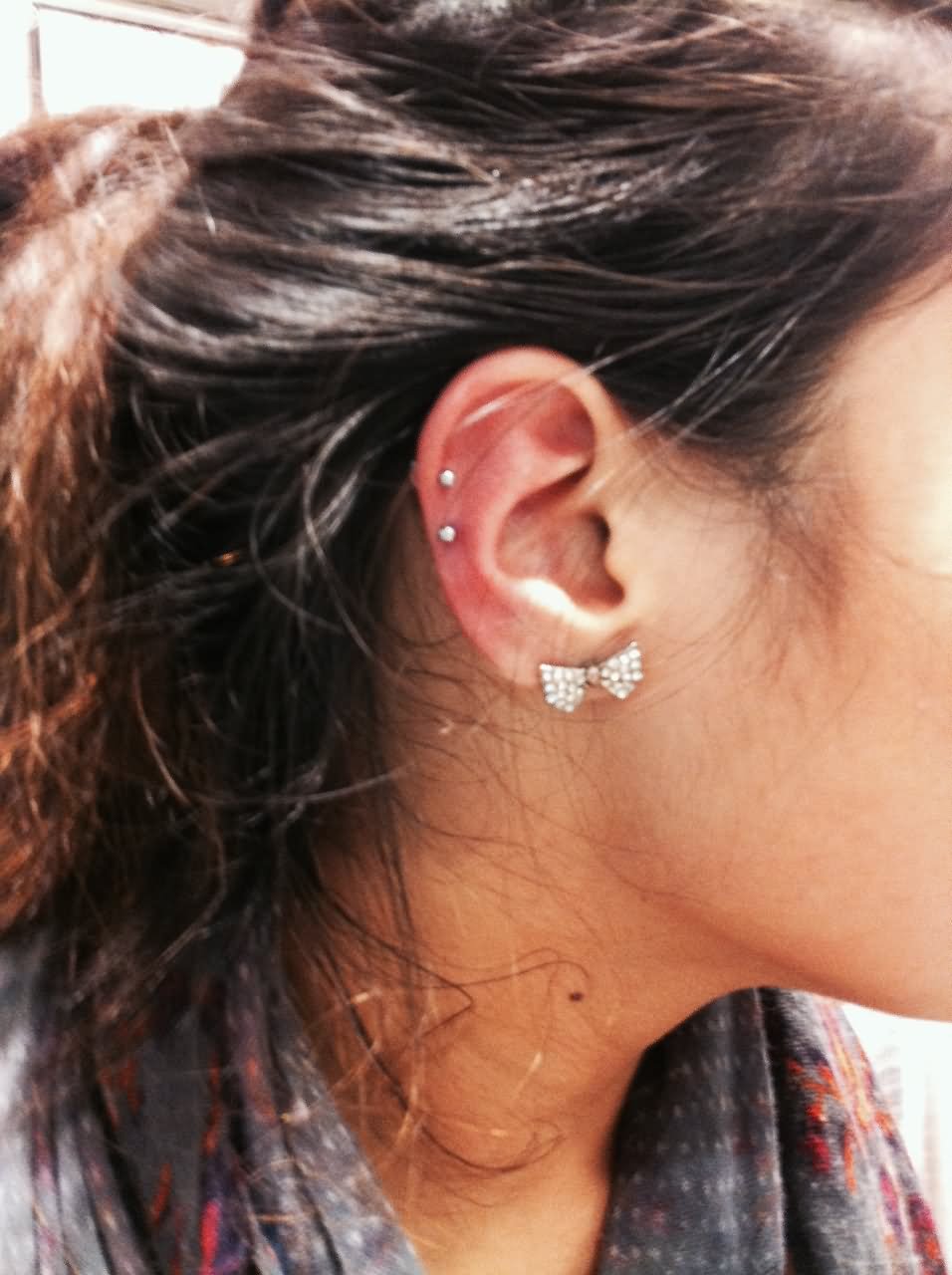 Helix Piercings With Silver Studs