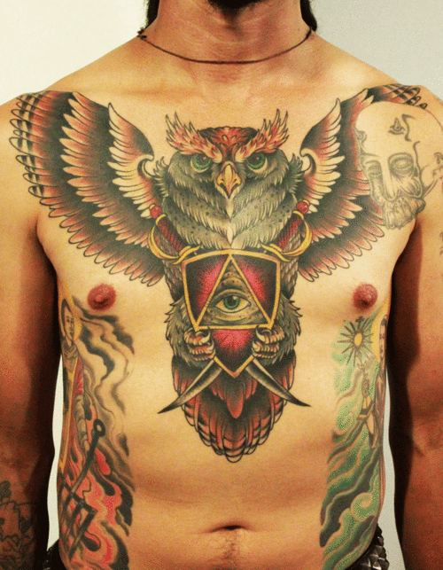 Impressive Traditional Owl Tattoo On Man Chest