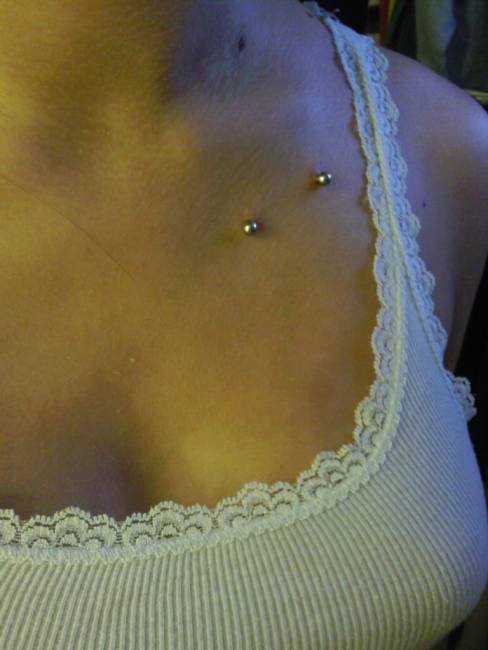 Left Clavicle Piercing With Silver Barbell