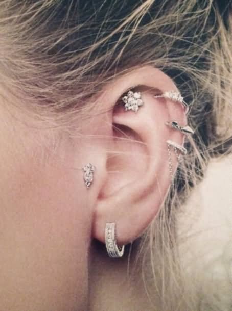 Left Ear Lobe And Helix Piercing For Girls