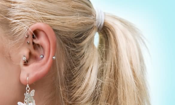 Left Ear Lobe And Snug Piercing For Girls