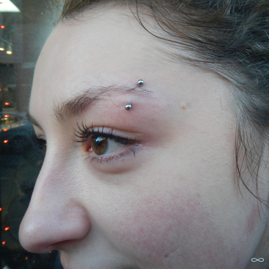 Left Eyebrow Piercing With Silver Barbell For Girls