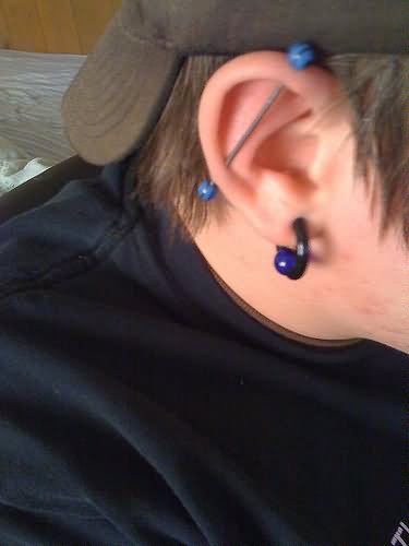 Lobe And Industrial Piercing For Men