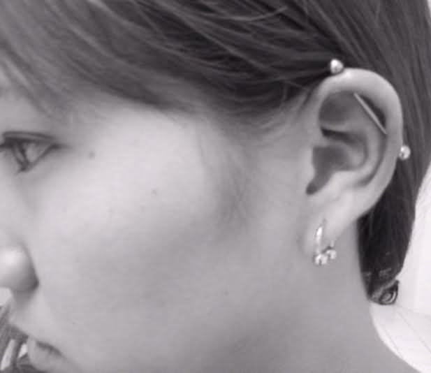 Lobe And Industrial Piercing For Young Girls