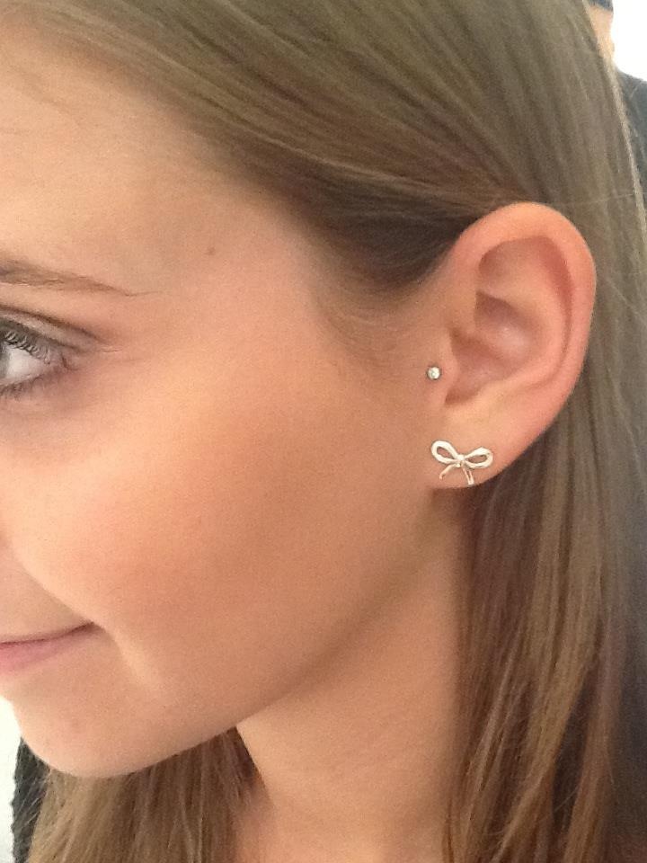Lobe Piercing With Bow Stud And Tragus Piercing