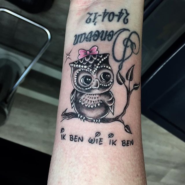Memorial Black Ink Small Owl Tattoo On Forearm