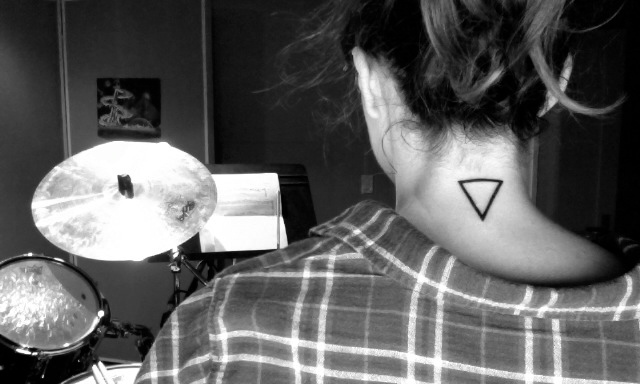 Mind Blowing Black Outline Triangle Tattoo On Girl Back Neck