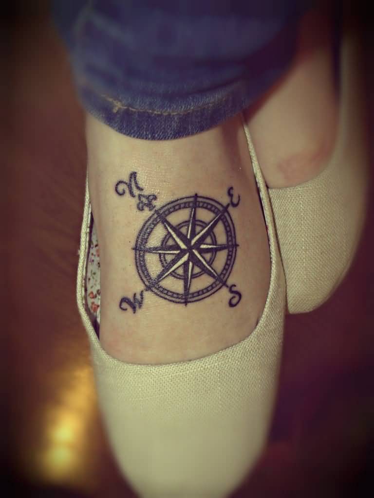 Nautical Compass Tattoo On Girl Left Foot