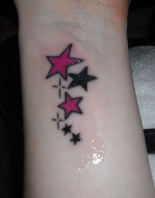 Pink And Black Star Tattoos On Wrist