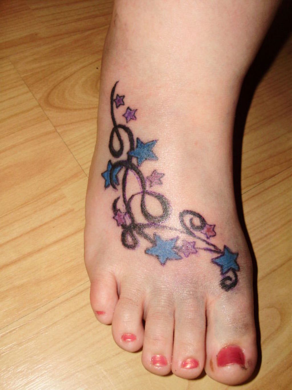 Pink And Blue Stars Cute Foot Tattoo